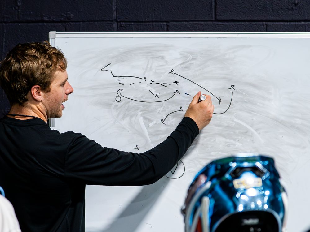 Yeti coach drawing a play for young players