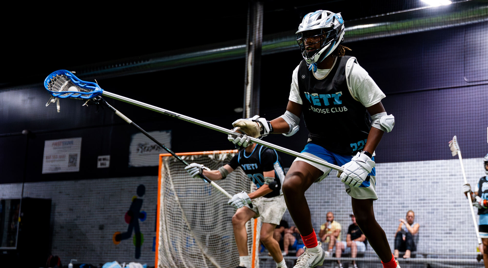 Yeti player defending in the indoor facility