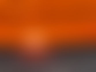 Sun setting in orange sky west of Ainse Vat beach, Noumea