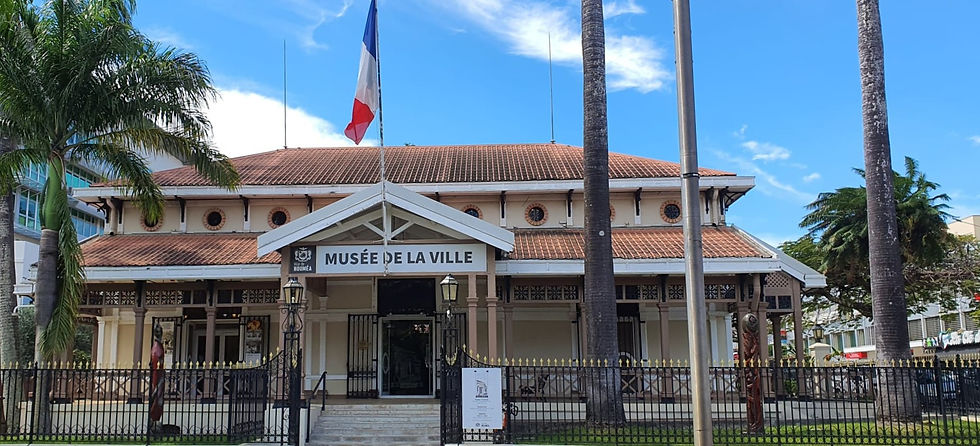 French colonial building now housing Noumea City Museum. Five steps at front entrance.