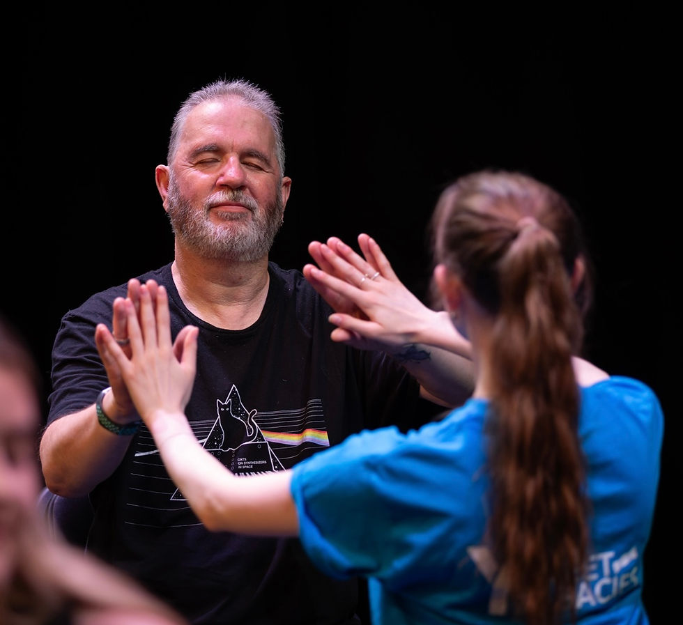 A moment of connection and trust during the making of Goldspun – movement, touch, and presence reminding us that creativity is a deeply human language.