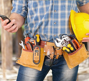 close-up-construction-worker-sending-text-mobile-phone.jpg