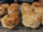 10 freshly baked scones cooling on a wire rack