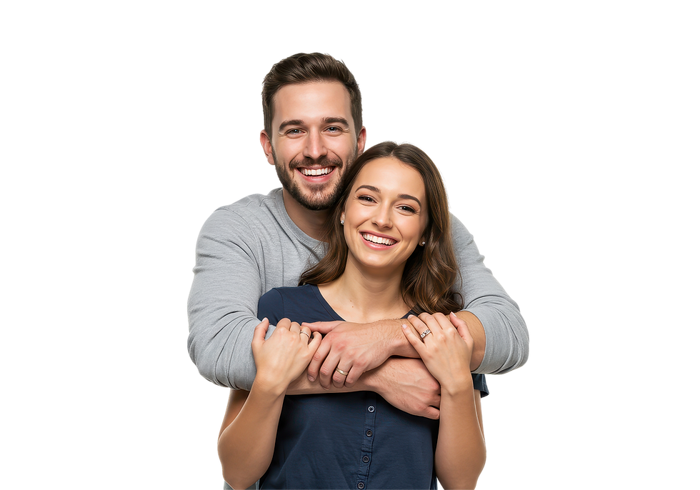 Happy young couple hugging and smiling directly at the camera, representing trust, support, and reassurance