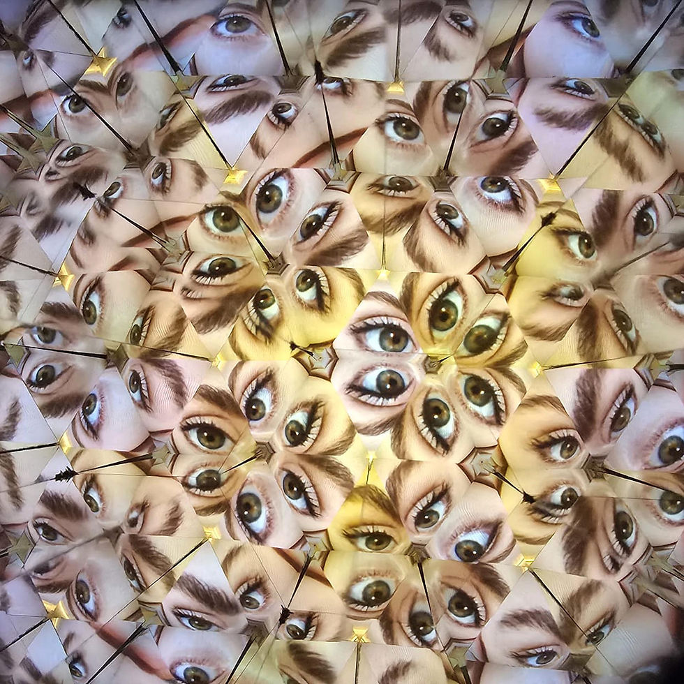 View through a brass teleidoscope lens - symmetrical pattern of the scene