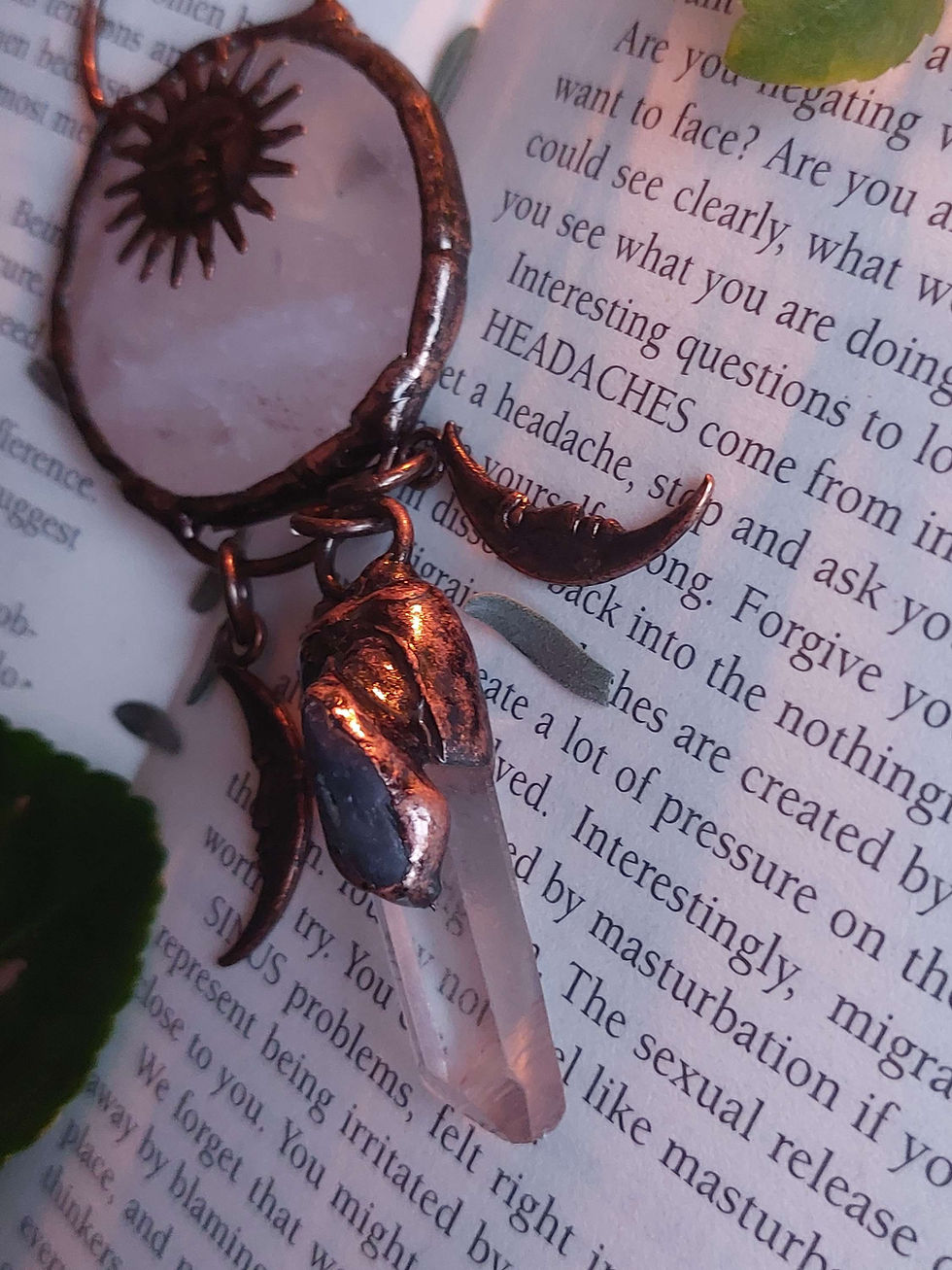 Thumbnail: Handmade rose quartz pendant with sun moon & stars
