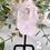 Thumbnail: Natural clear quartz crystal on metal stand