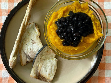Sword fish steak with pumpkin potage and black beans