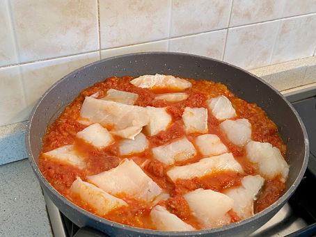 Cod with onions and tomato salsa