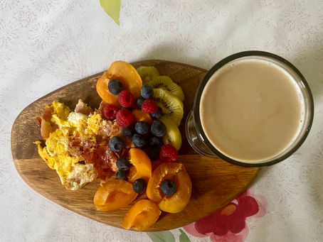 Fruit and scrambled egg for breakfast