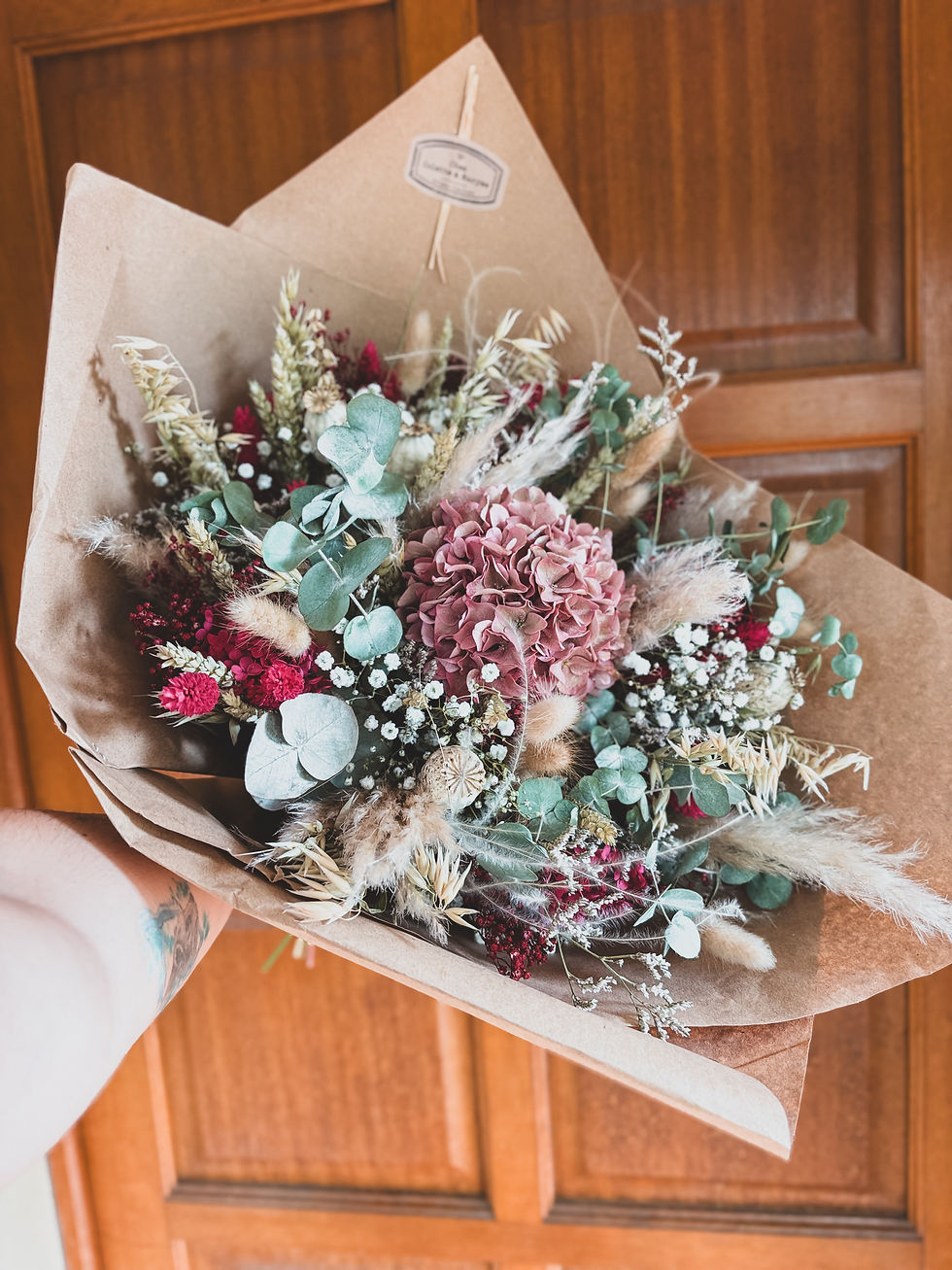 Bouquet de fleurs séchées aux teintes rosé