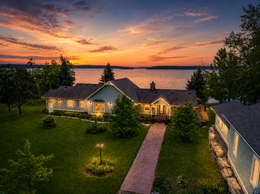 Waterfront estate on Pigeon Lake in Kawartha Lakes at sunset