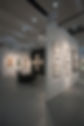 hardwall with art hanging on it