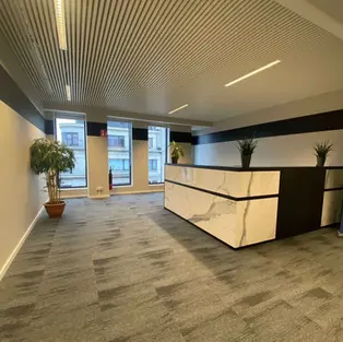 Onthaal van kantoorgebouw Belliard 65 in Brussel