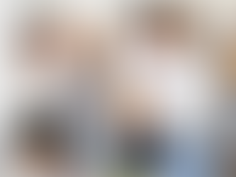 Group of professionals networking during a corporate event, enjoying drinks and conversation at Aran Islands Hotel.