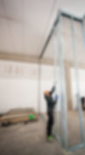 worker-builds-a-plasterboard-wall-2023-11-27-05-12-03-utc.jpg