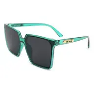 Thumbnail: Green sunglasses with dark lenses displayed isolated on a white background.