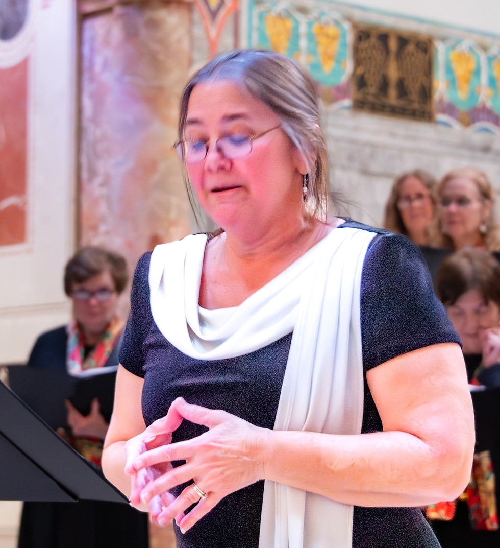 woman in black dress standing