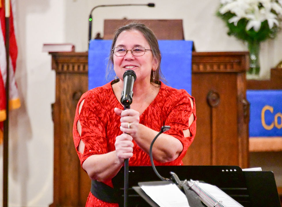 woman in red dress smiling