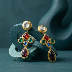 Pair of ornate multi-color gemstone drop earrings with matte gold settings featuring red, green, blue, and burgundy stones.
