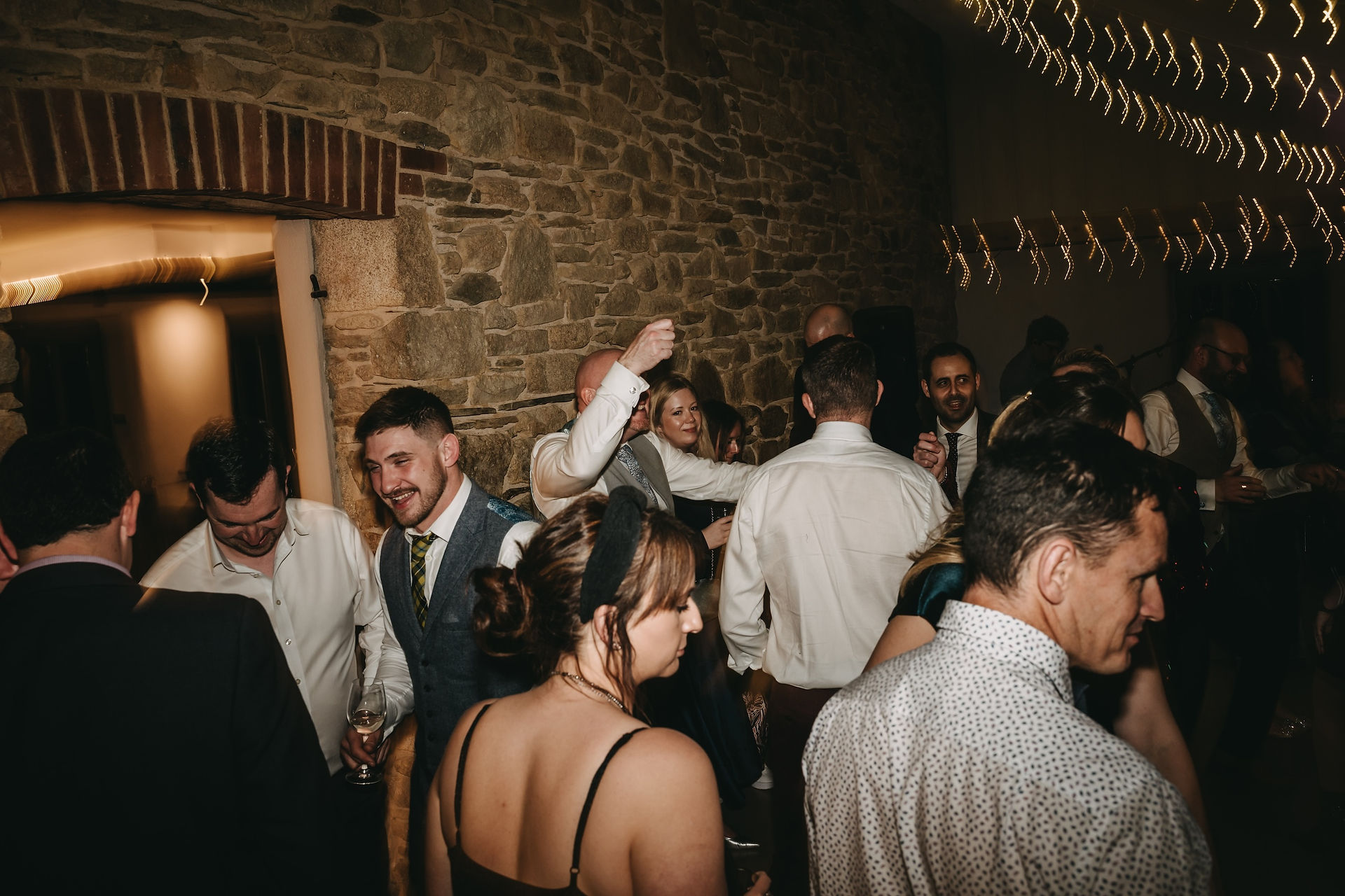 Wedding guests dancing and celebrating