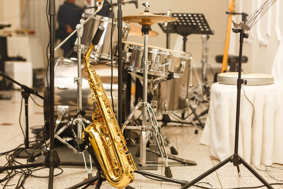 A band's setup on stage at a wedding