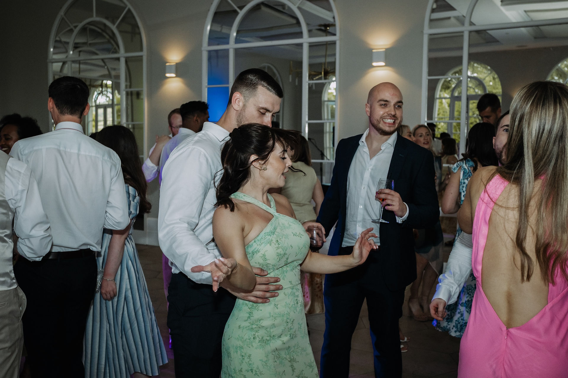 Wedding guests dancing
