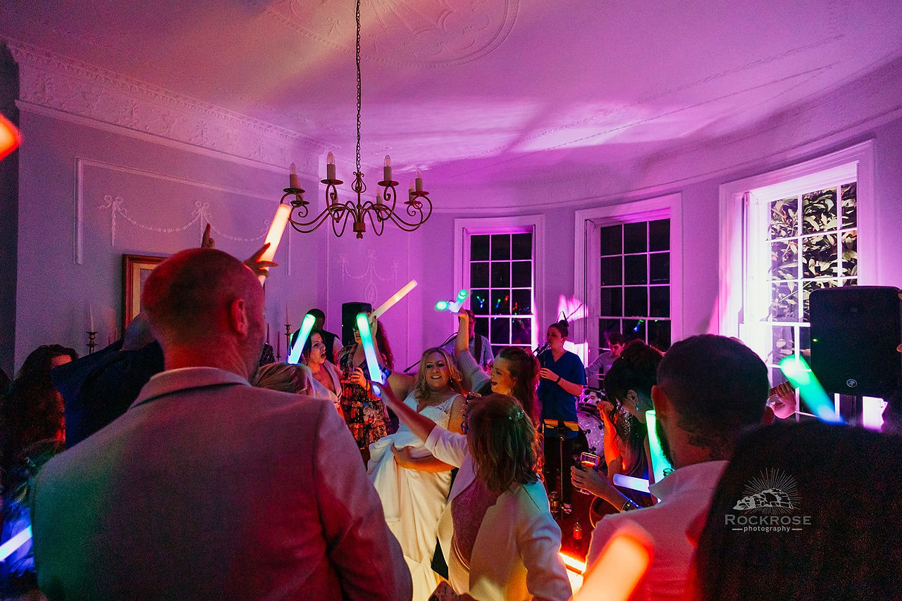 People dancing to a wedding band
