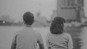 husband and wife looking away from each other