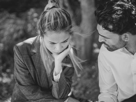 woman upset man looking at her