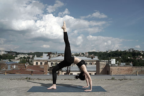 Girl Doing Yoga on a Rooftop