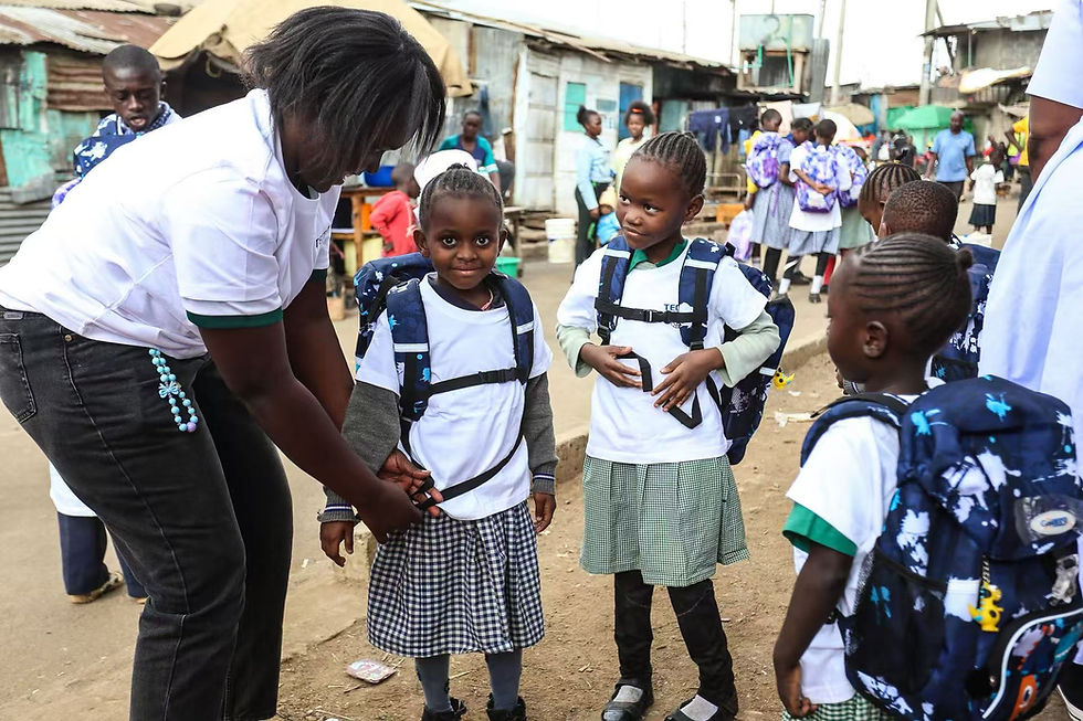 Students in Africa receiving donated backpacks from Orient Bag