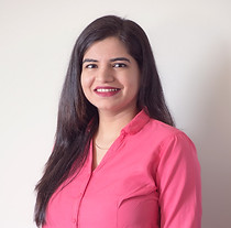 Headshot of clinical psychologist Sherebanu smiling