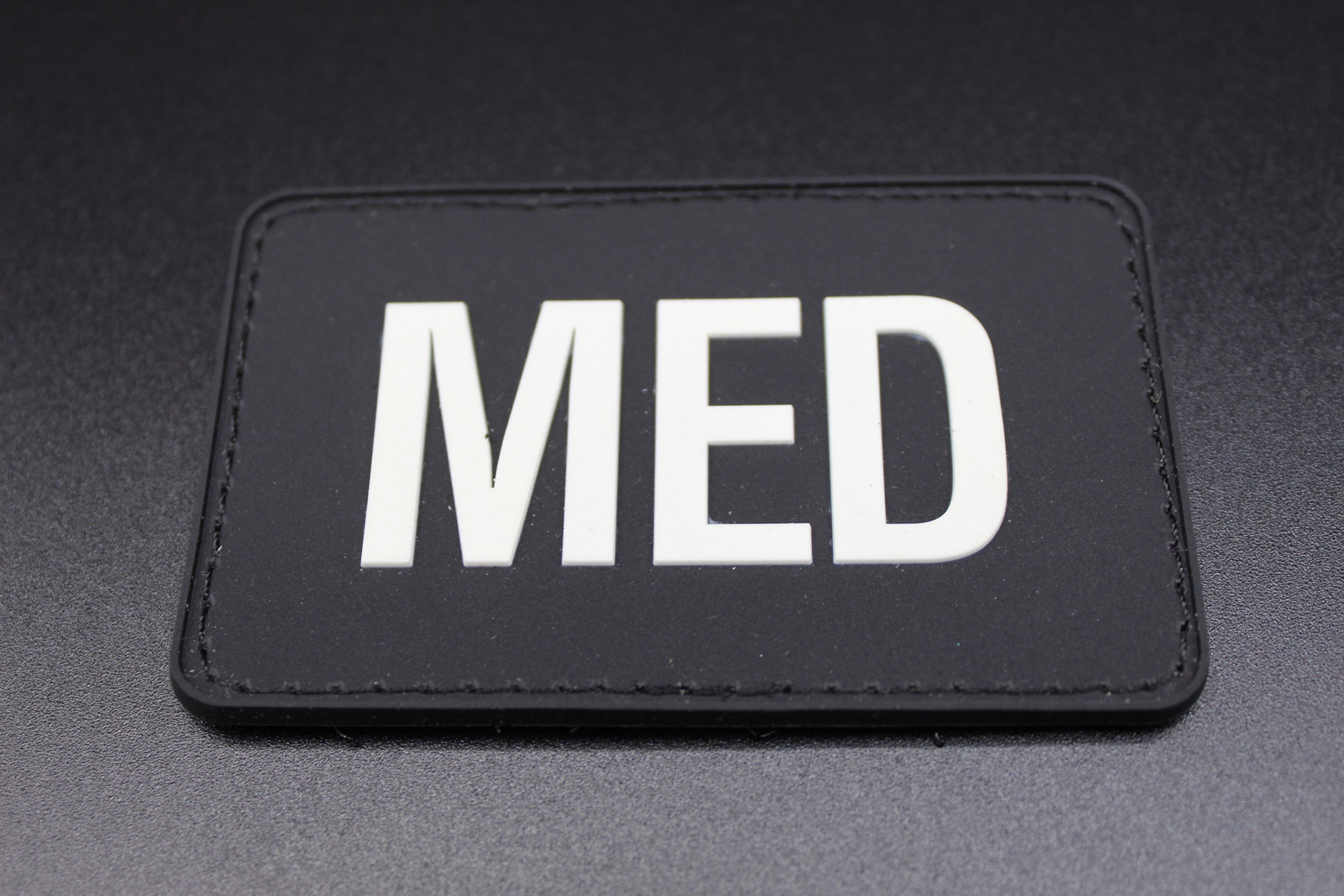 PVC patch with word MED on it in white 