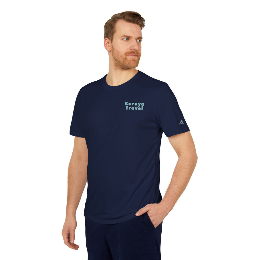 Man in navy blue Karaya Travel Adidas shirt