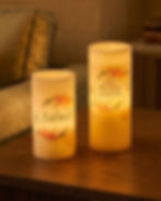 The Blush Wreath personalized flameless LED candle set of 2 medium and large glowing at night