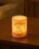 The Blush Wreath personalized flameless LED candle small size glowing at night