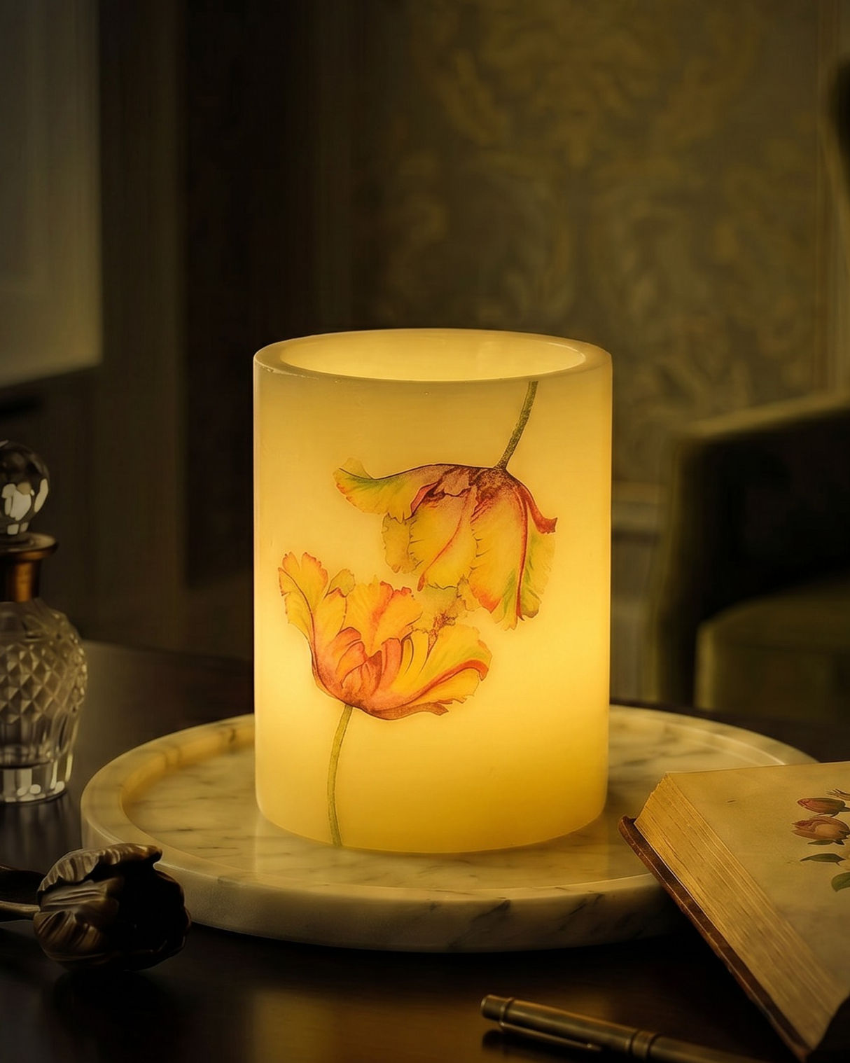 The Amber Tulip personalized flameless LED candle small size, watercolor amber and orange tulip design glowing at night