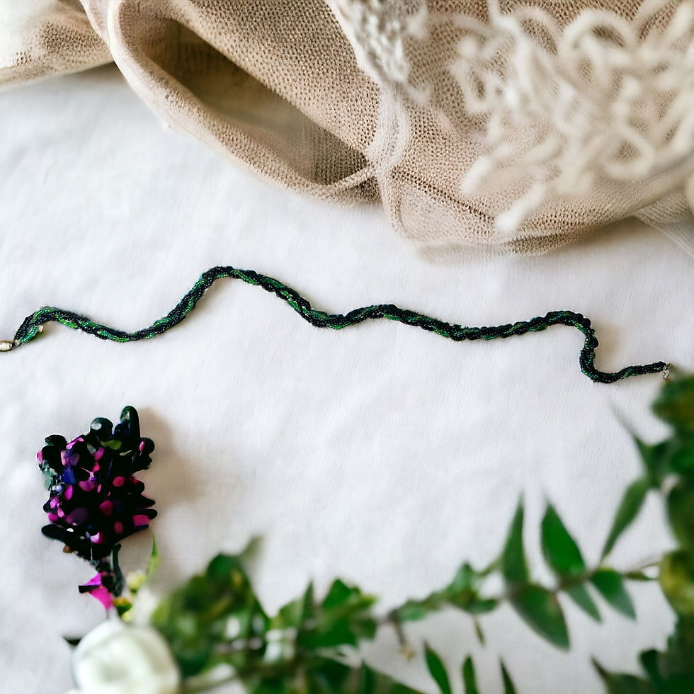 Thumbnail: Braided Necklace with Green and Iridescent Black Beads.
