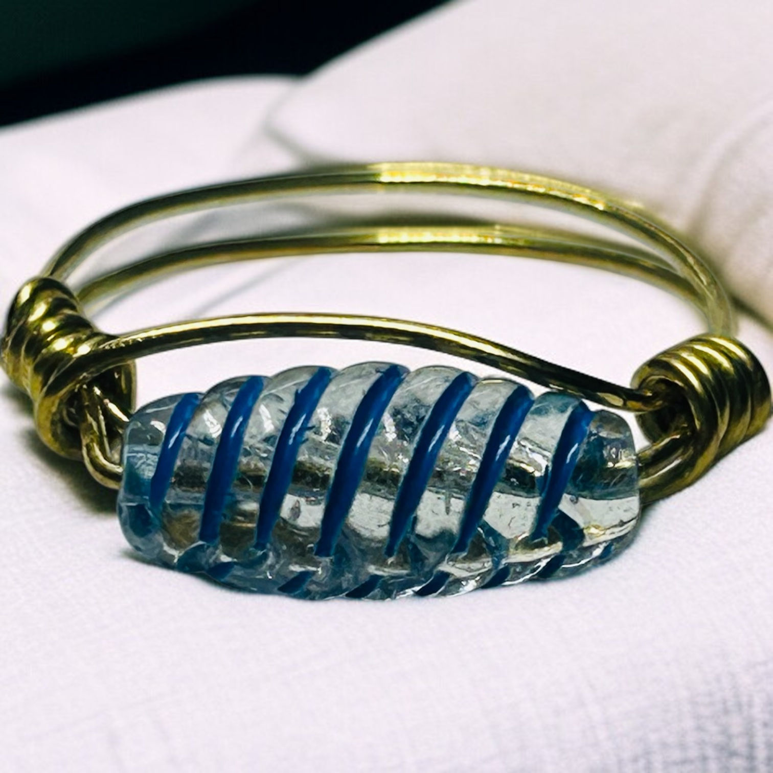 Clear Stone with Blue Strip Design on Gold Wire