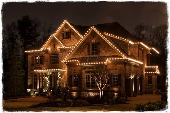 House decorated with Christmas lights at night