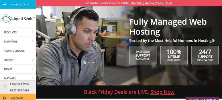 Man with headset working at a desk in an office, Liquid Web logo, text promoting fully managed web hosting, and Black Friday deals.