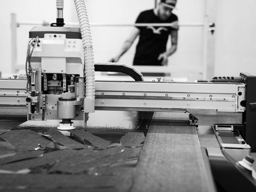 Overhead cutting machine used to cut carbon fiber wheelsets