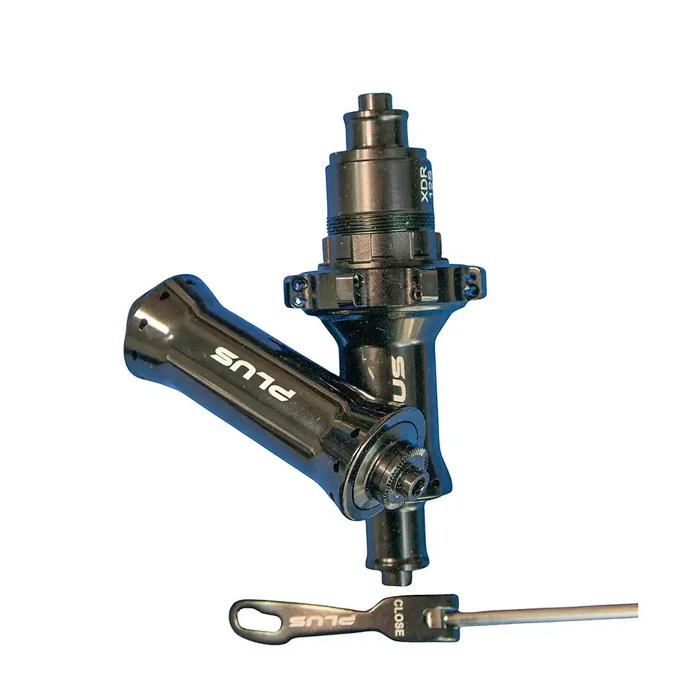 Black PLUS bicycle hubset and adjustment tool on white background for sale