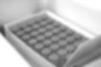 image of a box of injectable medication vials. only the gray tops can be seen.