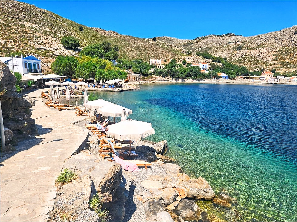 Emporios beach by the paved coastal path