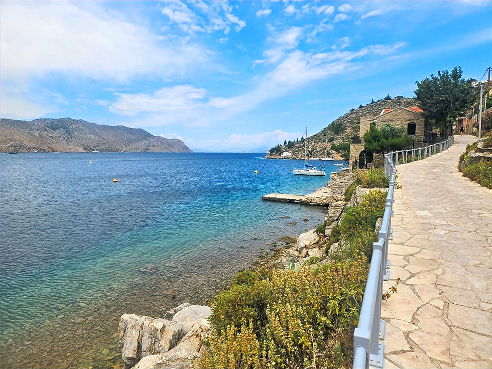 Paved coastal path between Emporios beach & Symi Town