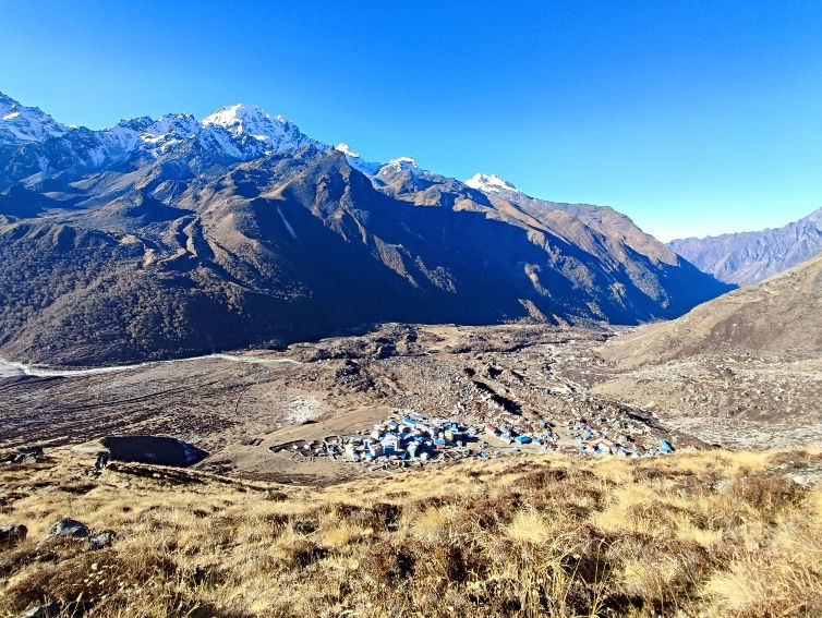 View of Kyanjin Gompa on the way up. The hike up Kyanjin Ri is one of several excellent day hikes while on the Langtang trek.