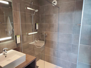 The bathroom at Kyriad Troyes Hotel.