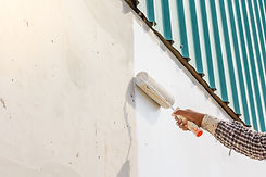 white-color-painting-wall-with-roller-hand.jpg
